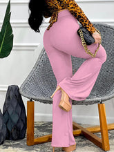 Pantalones acampanados ajustados de cintura alta y lisos